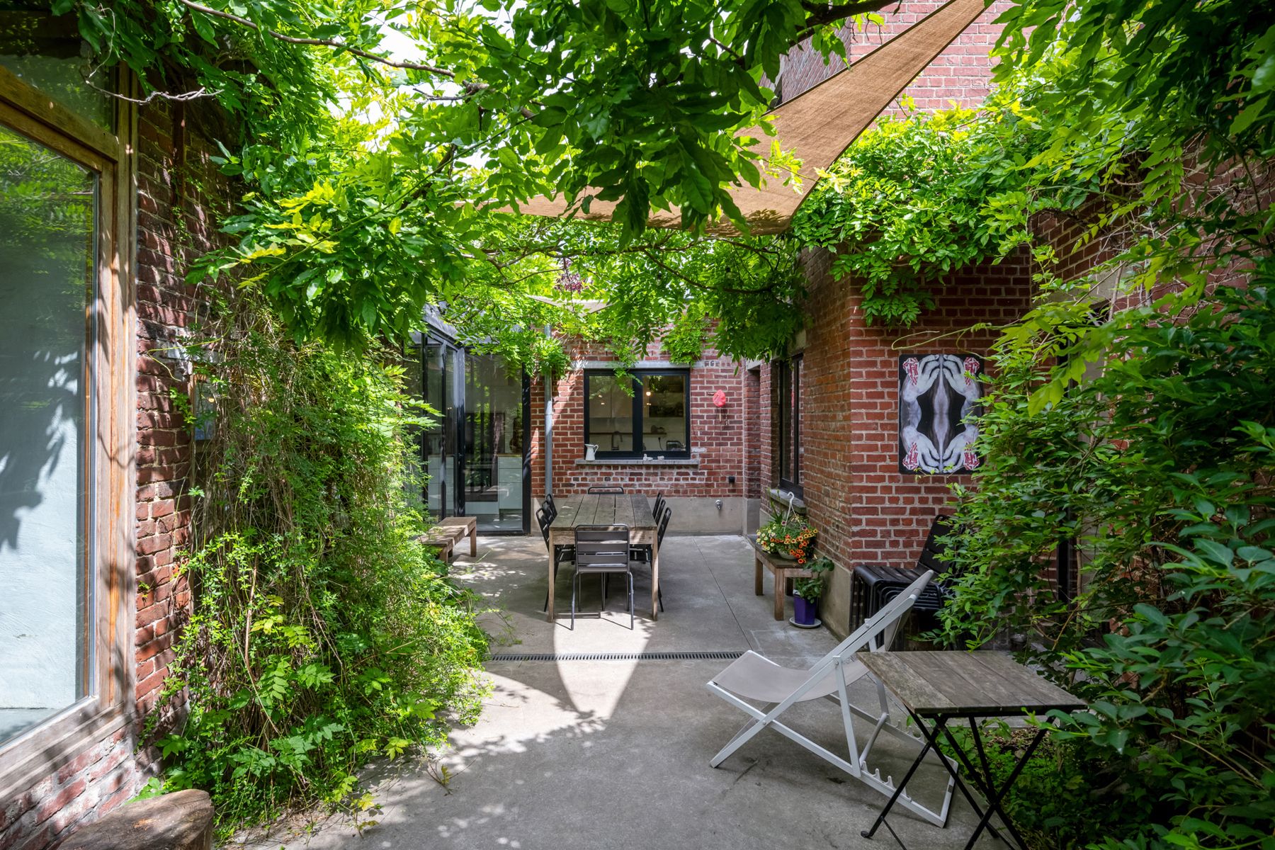Architecturaal verbouwde hoeve met binnenkoer foto 9