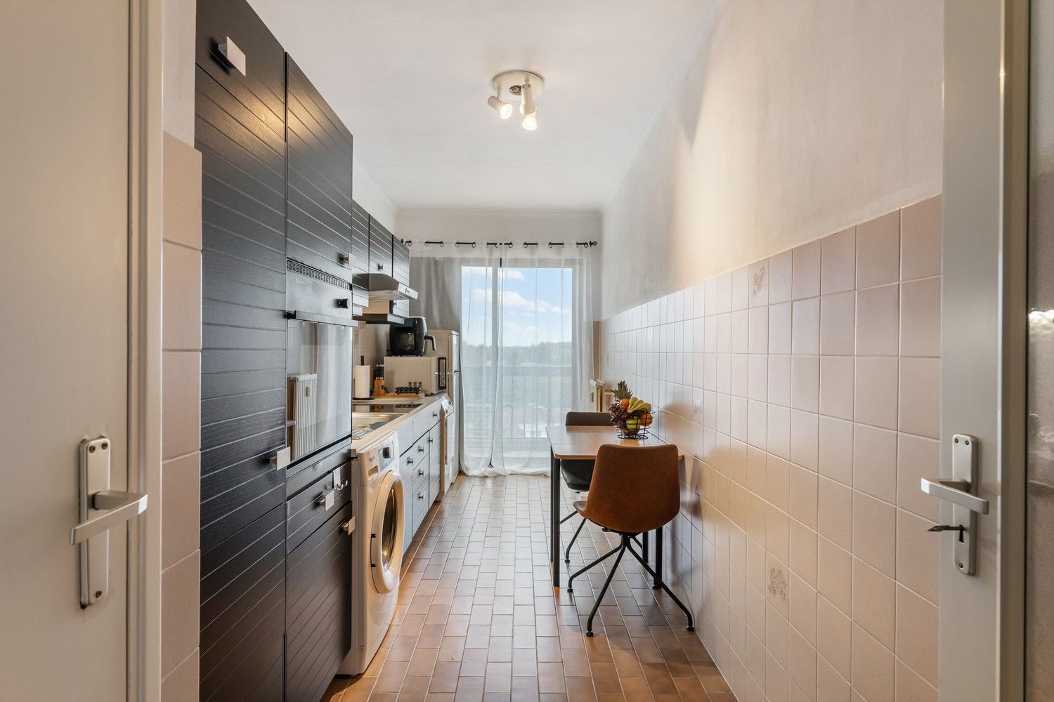 Centraal gelegen appartement met 2 slaapkamers, kelder en een autostaanplaats foto 7