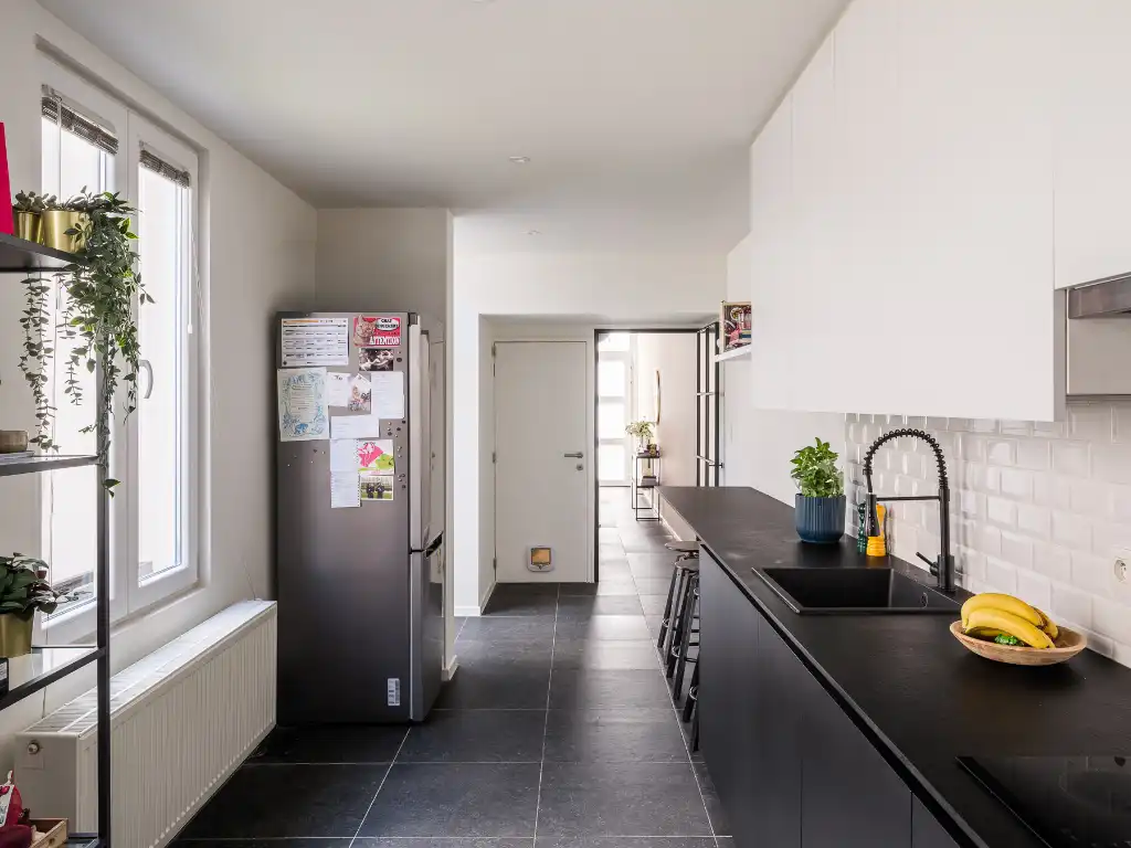 Karaktervolle woning met 4 slaapkamers en zonnige stadstuin op een boogscheut van het centrum van Gent. foto 9