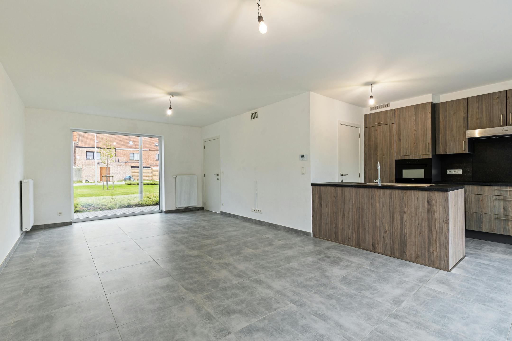 Instapklare woning met carport te koop in centrum Eeklo foto 7