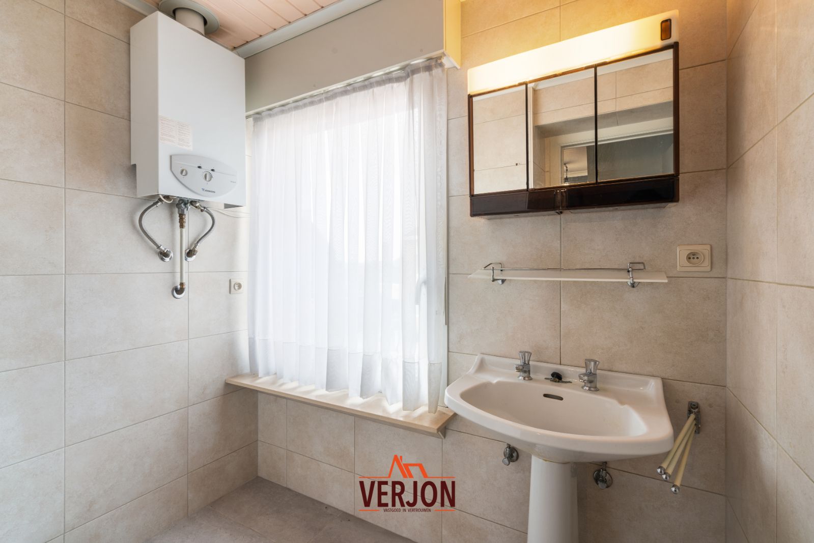 Woning met zuidgerichte tuin te koop in Kachtem! foto 13
