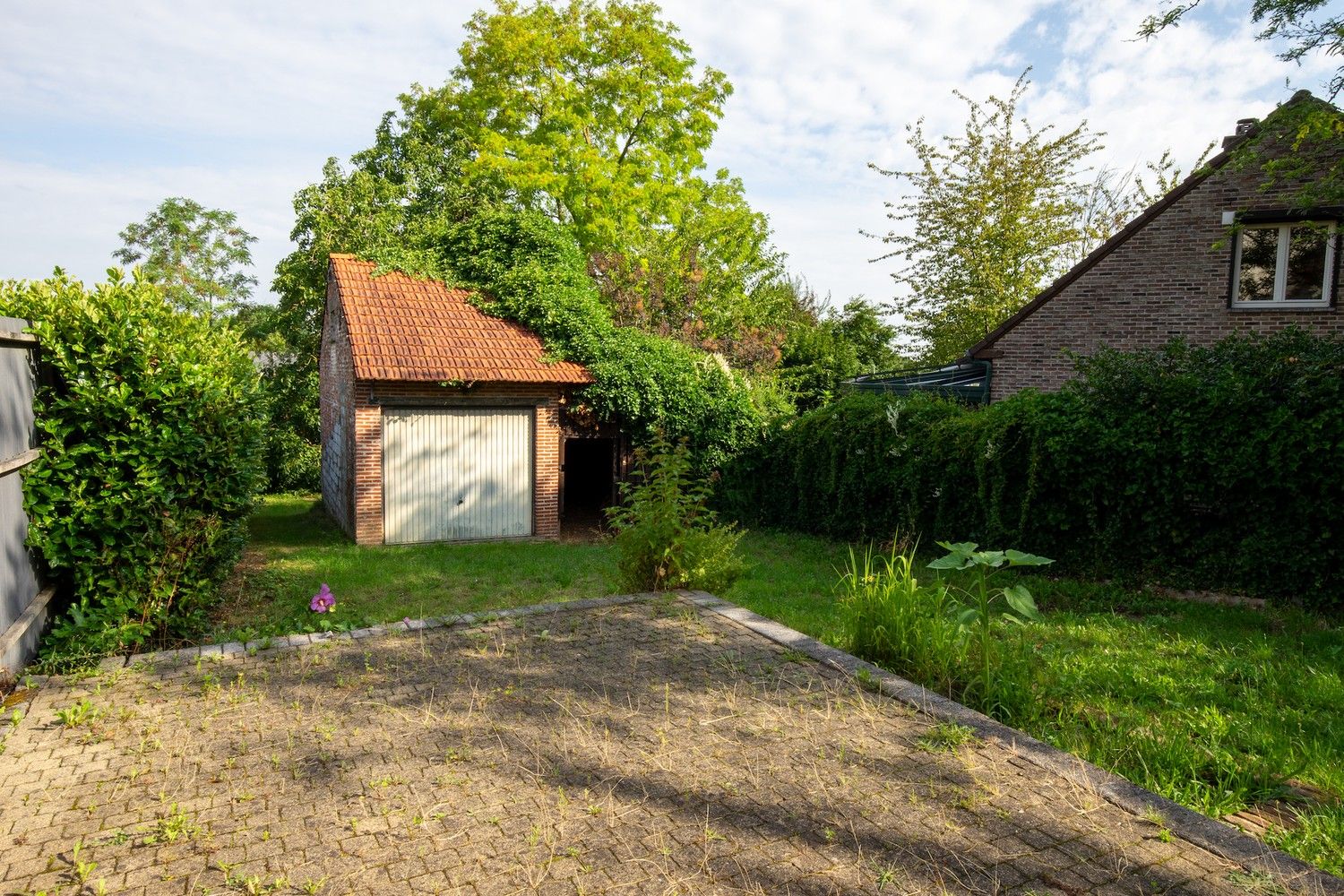 Charmante halfopen woning met 3 slaapkamers, ruime garage en gunstige ligging in Holsbeek foto 16