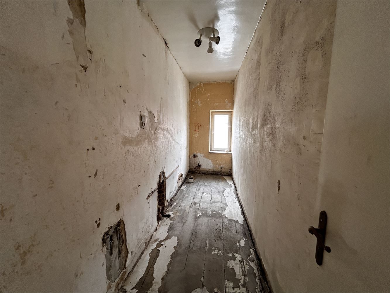 Te renoveren handelshuis met woonst foto 30