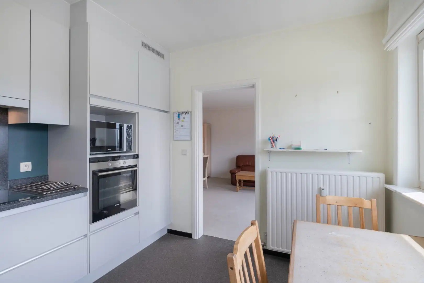 Ruim appartement op de 3° verdieping in hartje Hoeselt, met 3 slaapkamers, garage en prachtig terras met panoramisch uitzicht.  foto 11