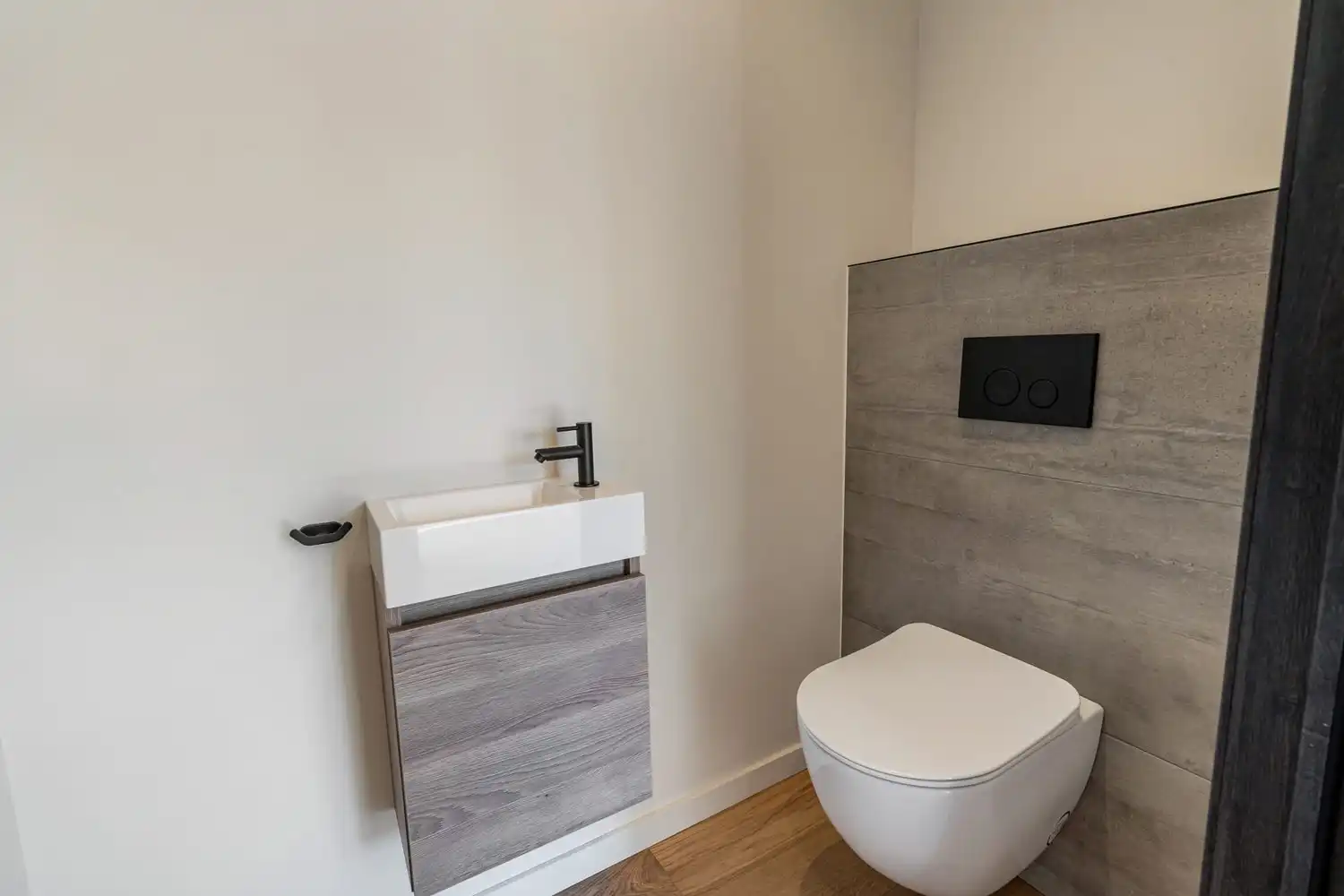 Instapklaar nieuwbouwappartement met 2 slaapkamers, tuin en terras in het centrum van Borgloon foto 14