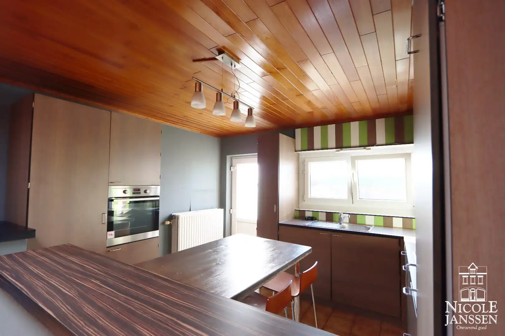 Gerenoveerde stadswoning met 2 slaapkamers en tuin  foto 4