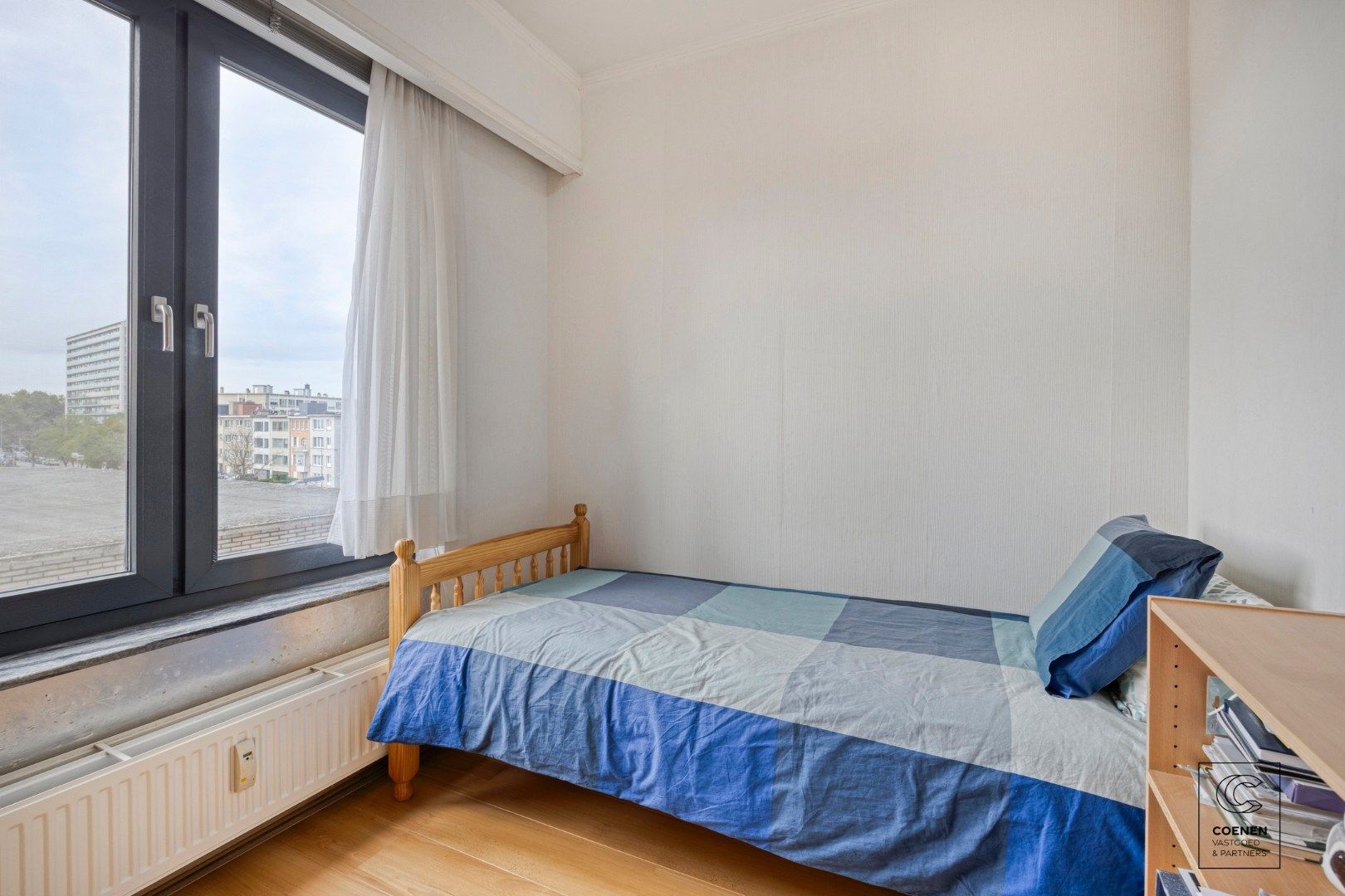 Ruim appartement van 104 m² met drie slaapkamers op centrale ligging te Merksem! foto 12