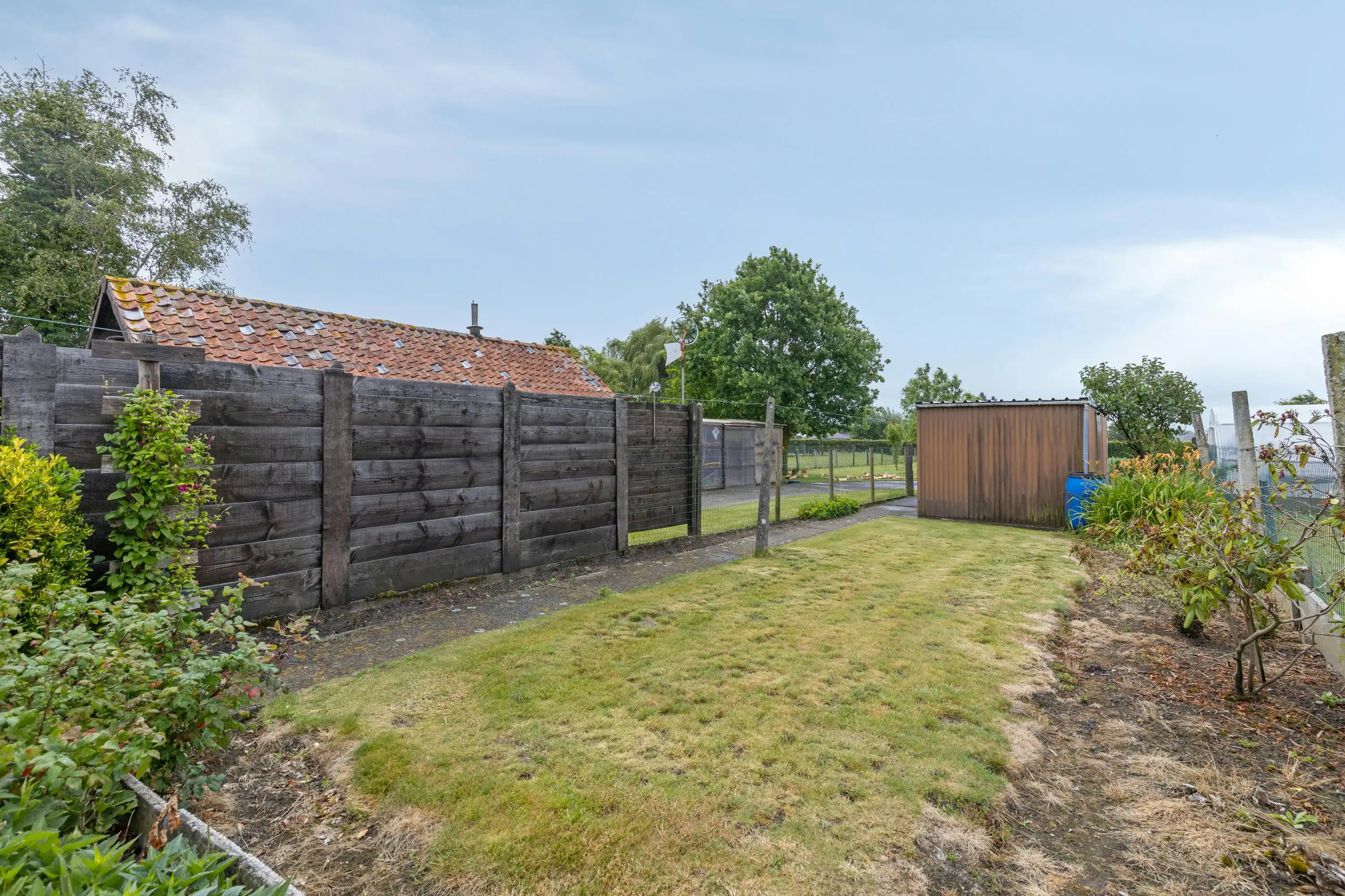 Huis te koop in Woesten met 3 kamers, garage en tuin foto 23