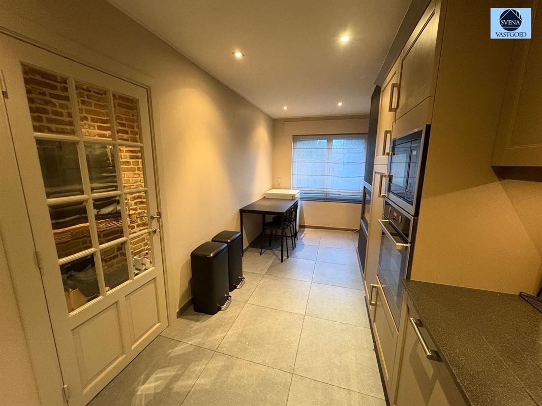 ZEER GEZELLIGE WONING MET GROTE TUIN TE LESSEN foto 4