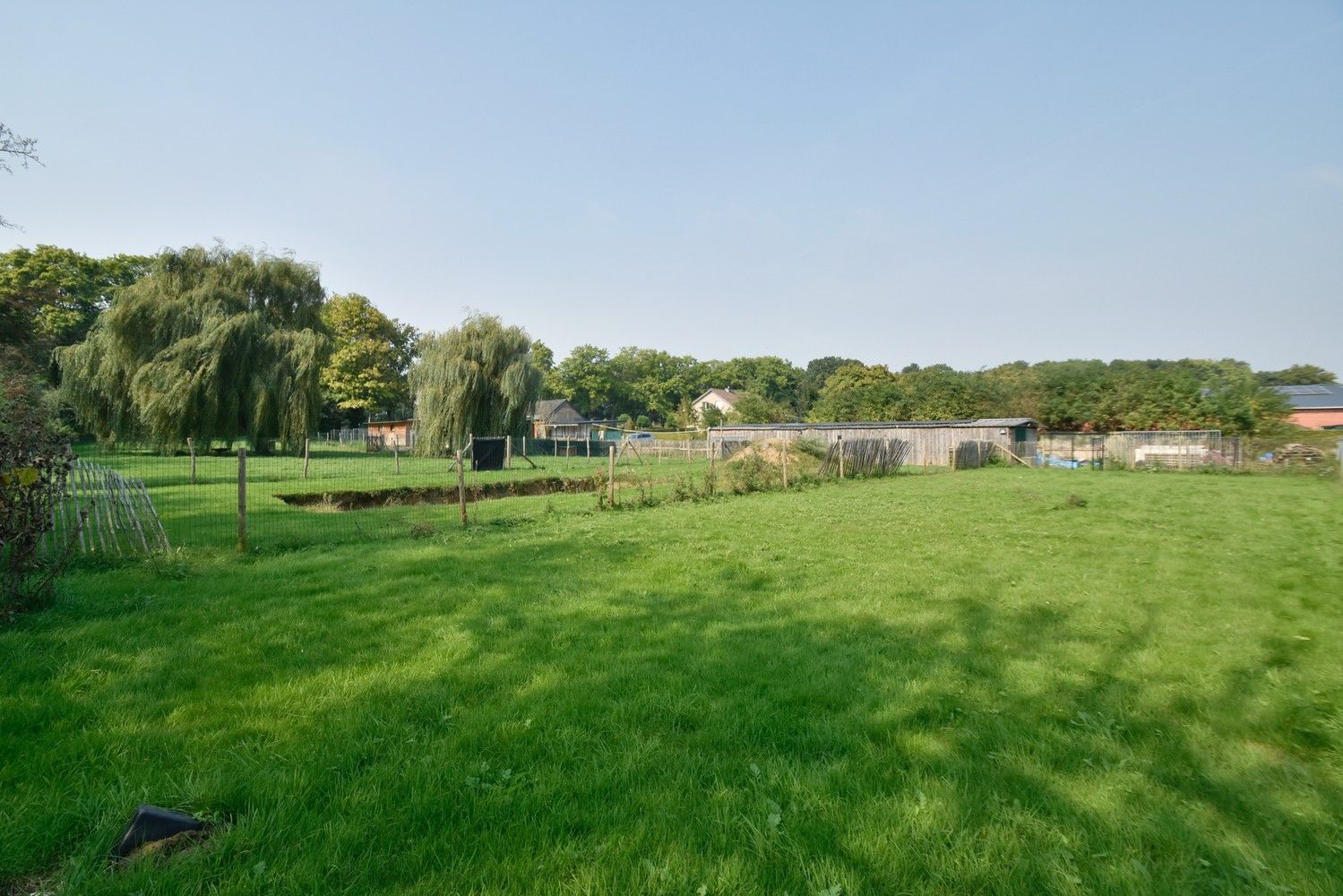 Grotendeels gemoderniseerde woning op een riant perceel gelegen aan de Zuid-Willemsvaart te Maasmechelen foto 8