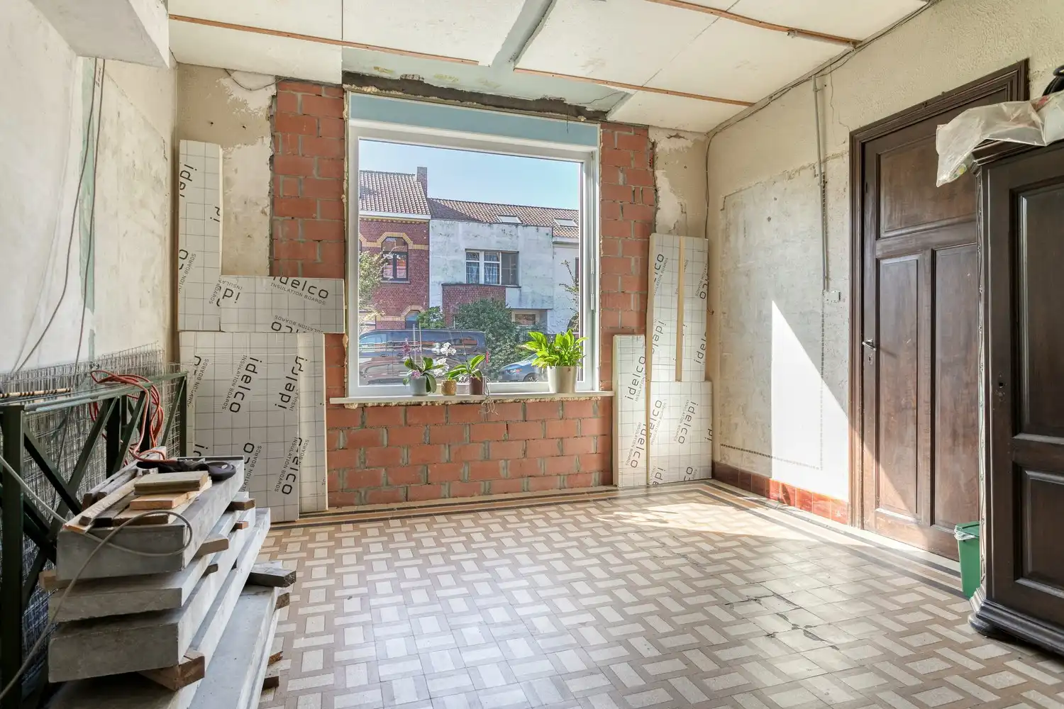 Karaktervolle stadswoning met renovatiepotentieel en unieke troef foto 3