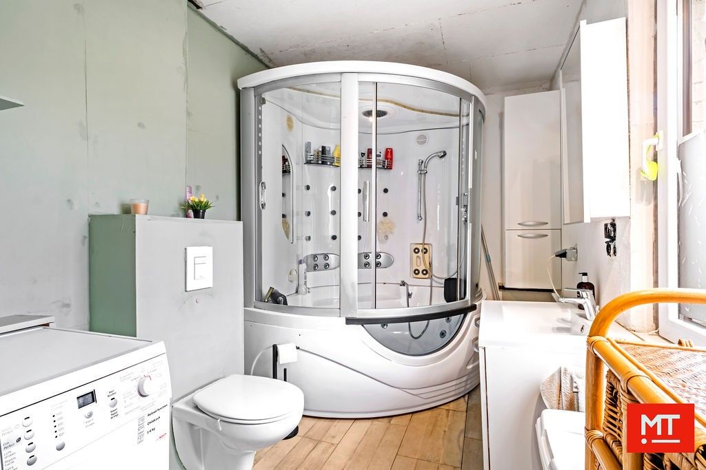 Halfopen woning in de dorpskern van Beselare foto 8