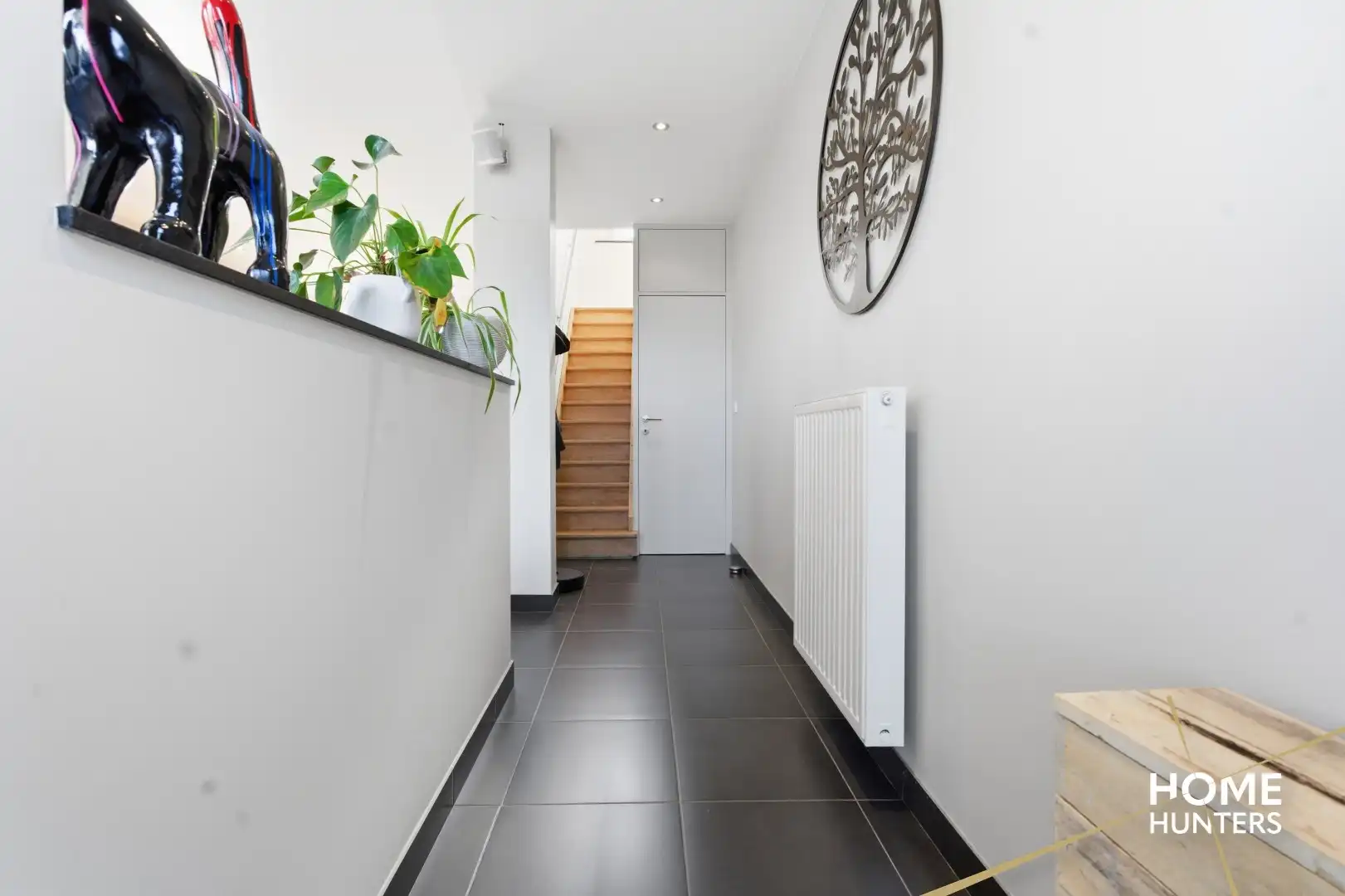 Volledig gerenoveerde gezinswoning met 4 slaapkamers en zuidgerichte tuin! foto 2