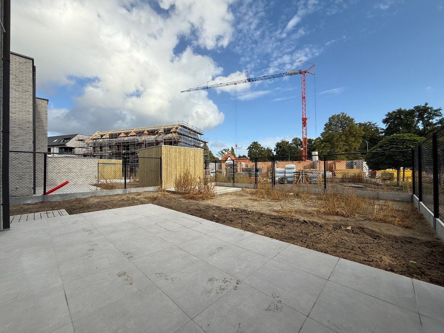 Nieuwbouw half open bebouwing met carport foto 11