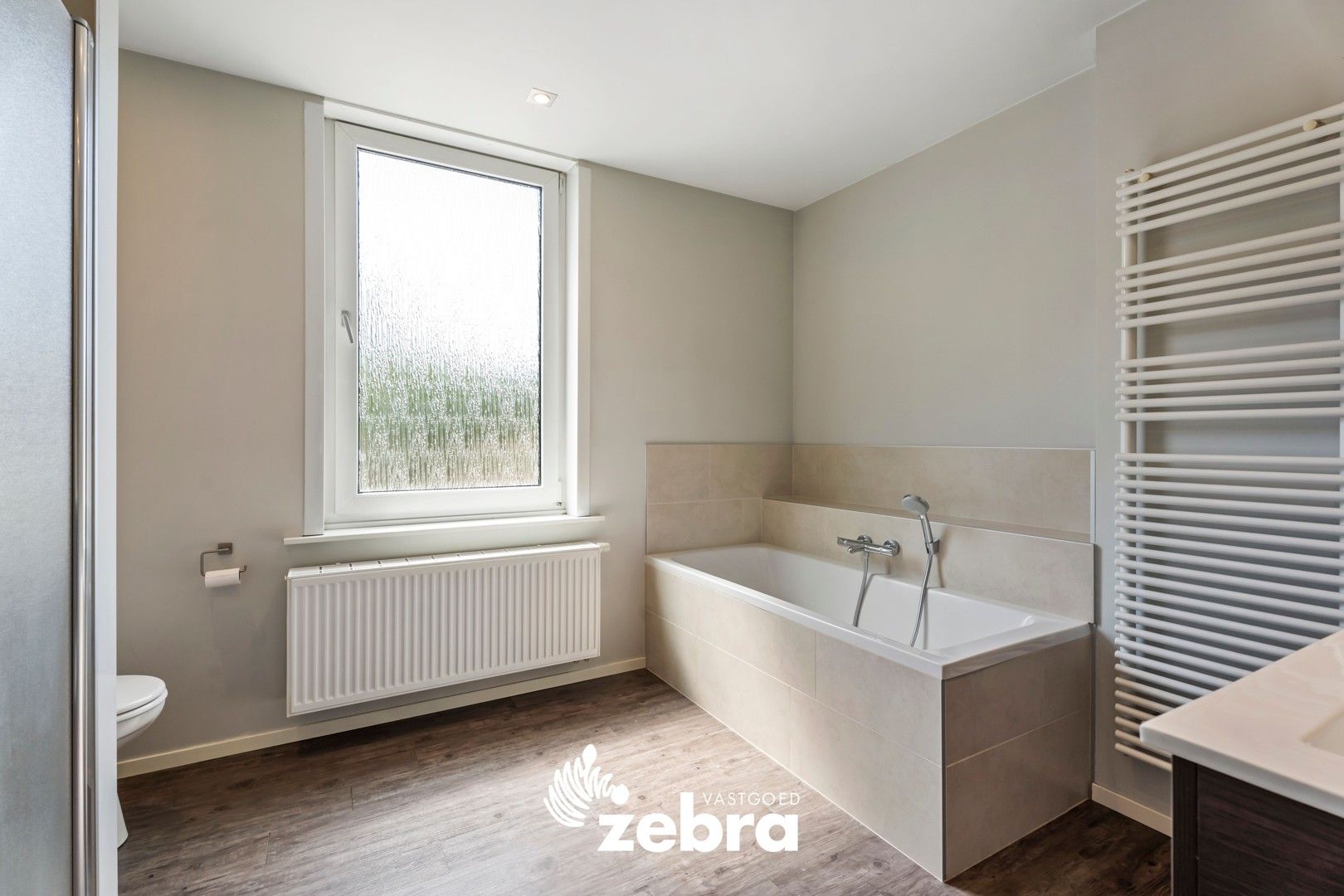 Karaktervolle woning met drie slaapkamers en zuidwestgerichte tuin te Tielt! foto 16