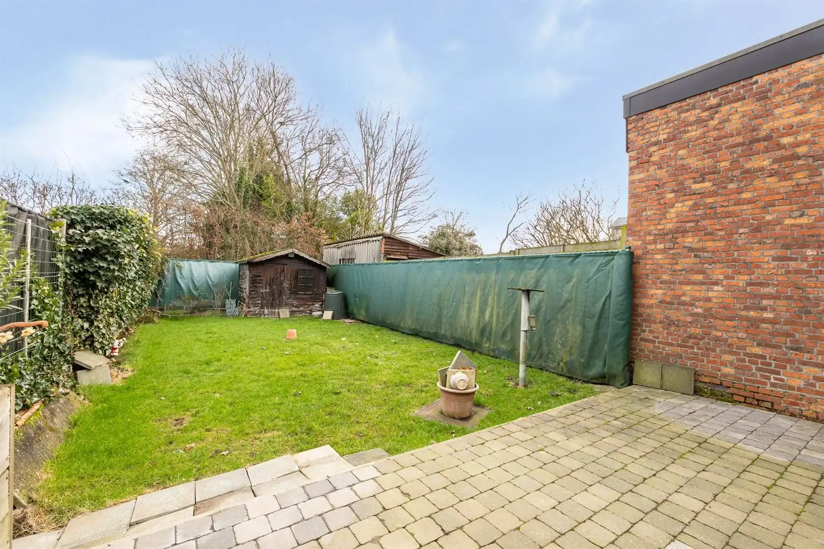 Te renoveren gezinswoning met tuin en garage in rustige centrumstraat foto 19