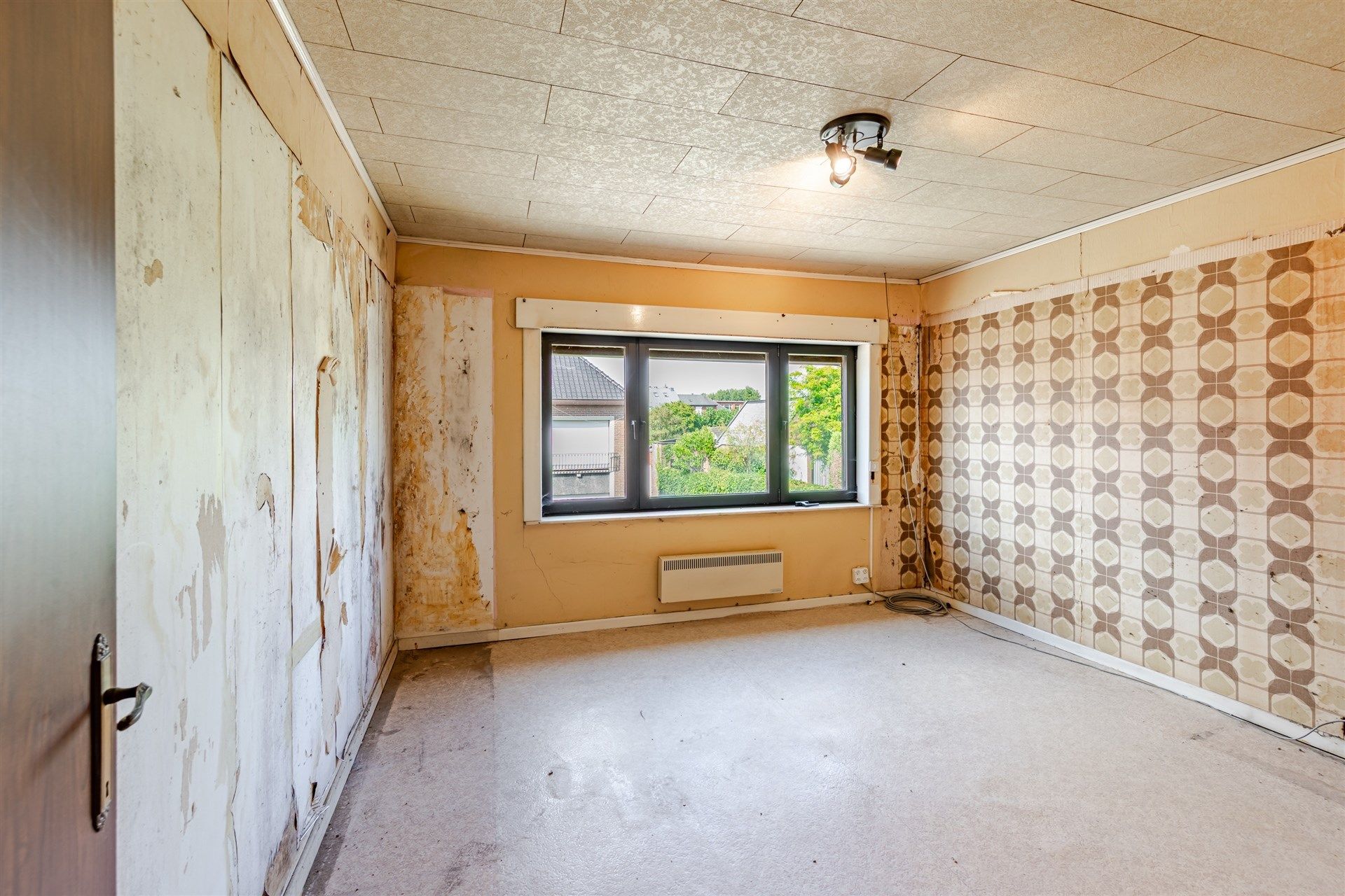 Te renoveren woning met tuin foto 11
