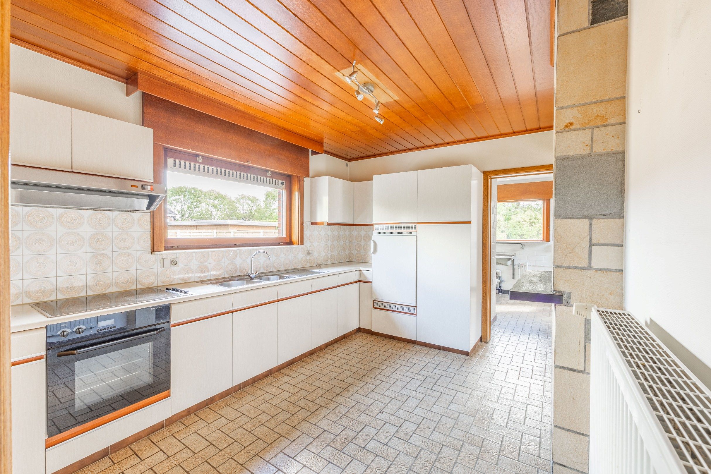 TRAPLOZE WONING MET ZONNIGE TUIN foto 8