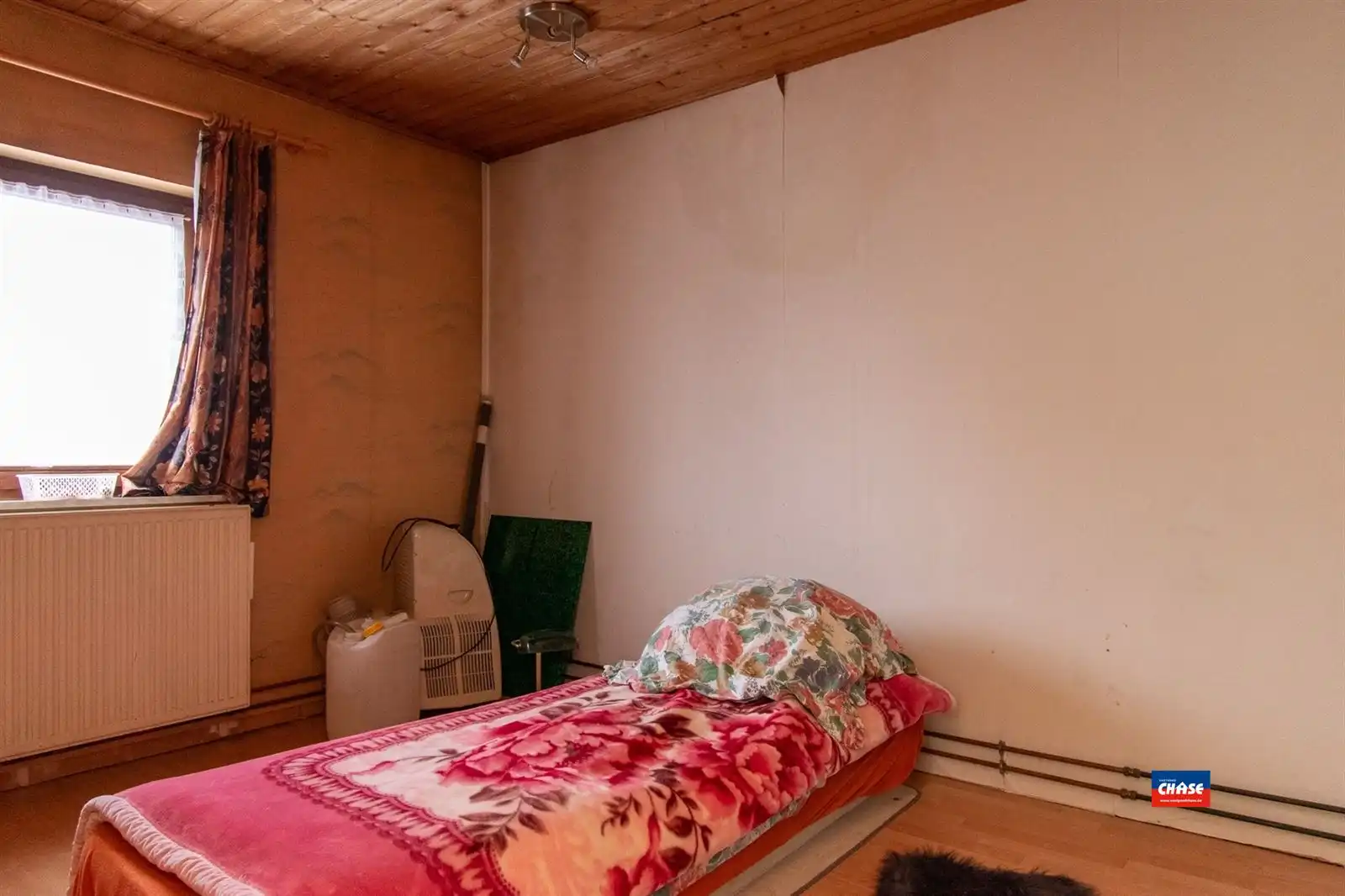 Te renoveren rijwoning met magazijn foto 8