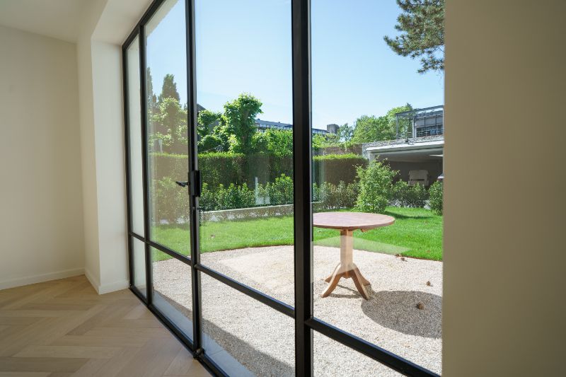 Modern appartement met mooi aangelegde tuin in centrum Gent foto 3