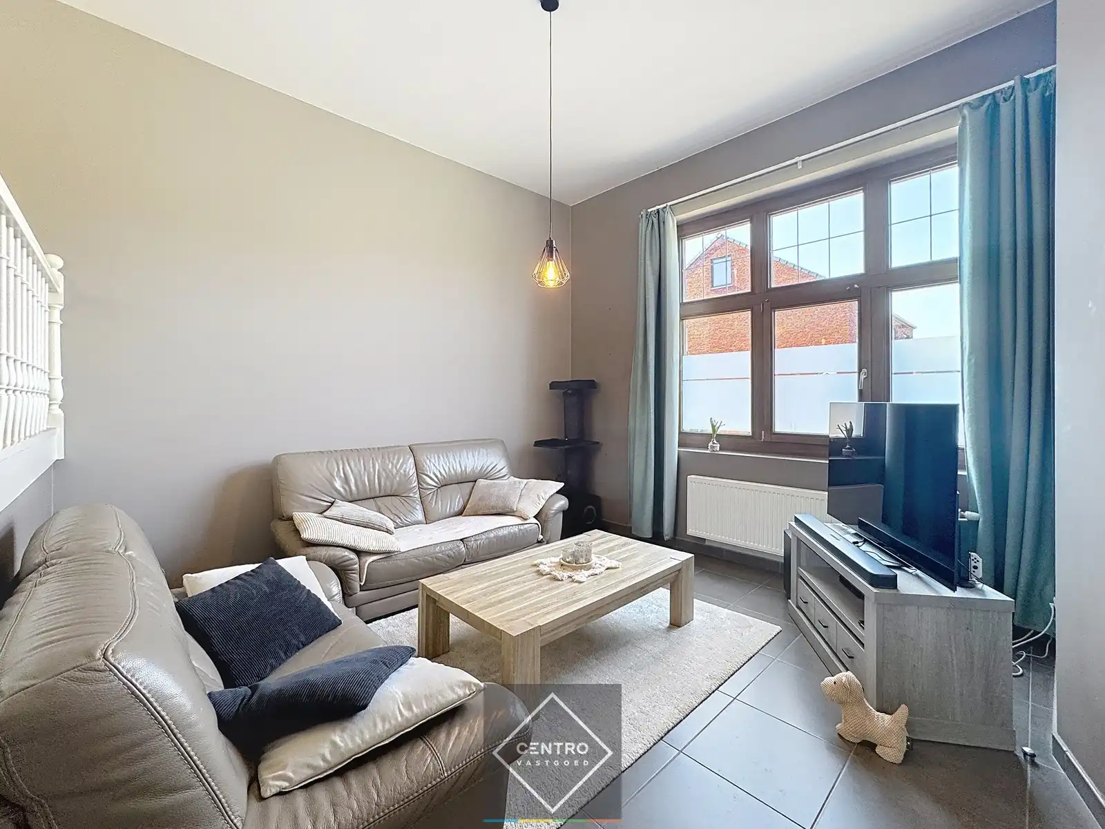 Leuke woning met alle COMFORT met 3 slpks, garage en ZUIDger. tuin! foto 2