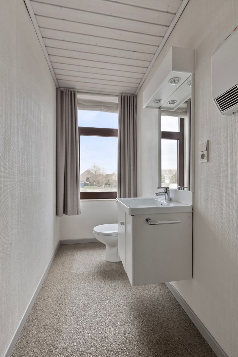 Charmante, gerenoveerde HOB met veranda en tuin in Hasselt – instapklaar en perfect gelegen! foto 23