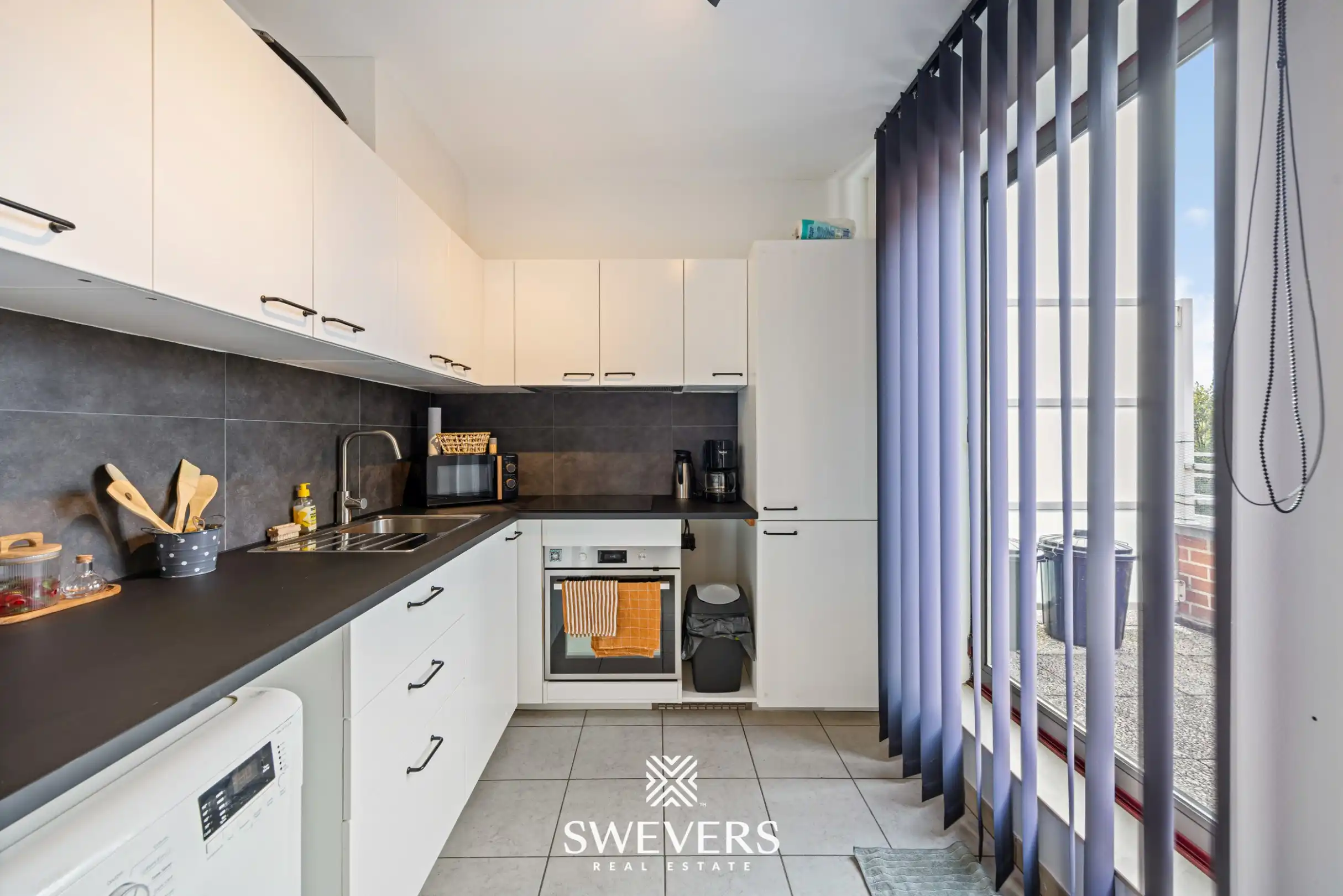 Ruim en opgefrist appartement met 1 slaapkamer, 2 terrassen en garagebox in Heppen foto 7