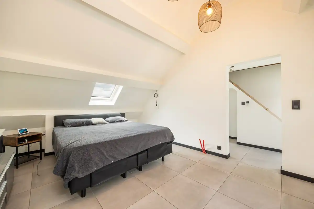 Ruim en instapklaar appartement met 3 slaapkamers, terras en autostaanplaats nabij het centrum van Wommelgem foto 17