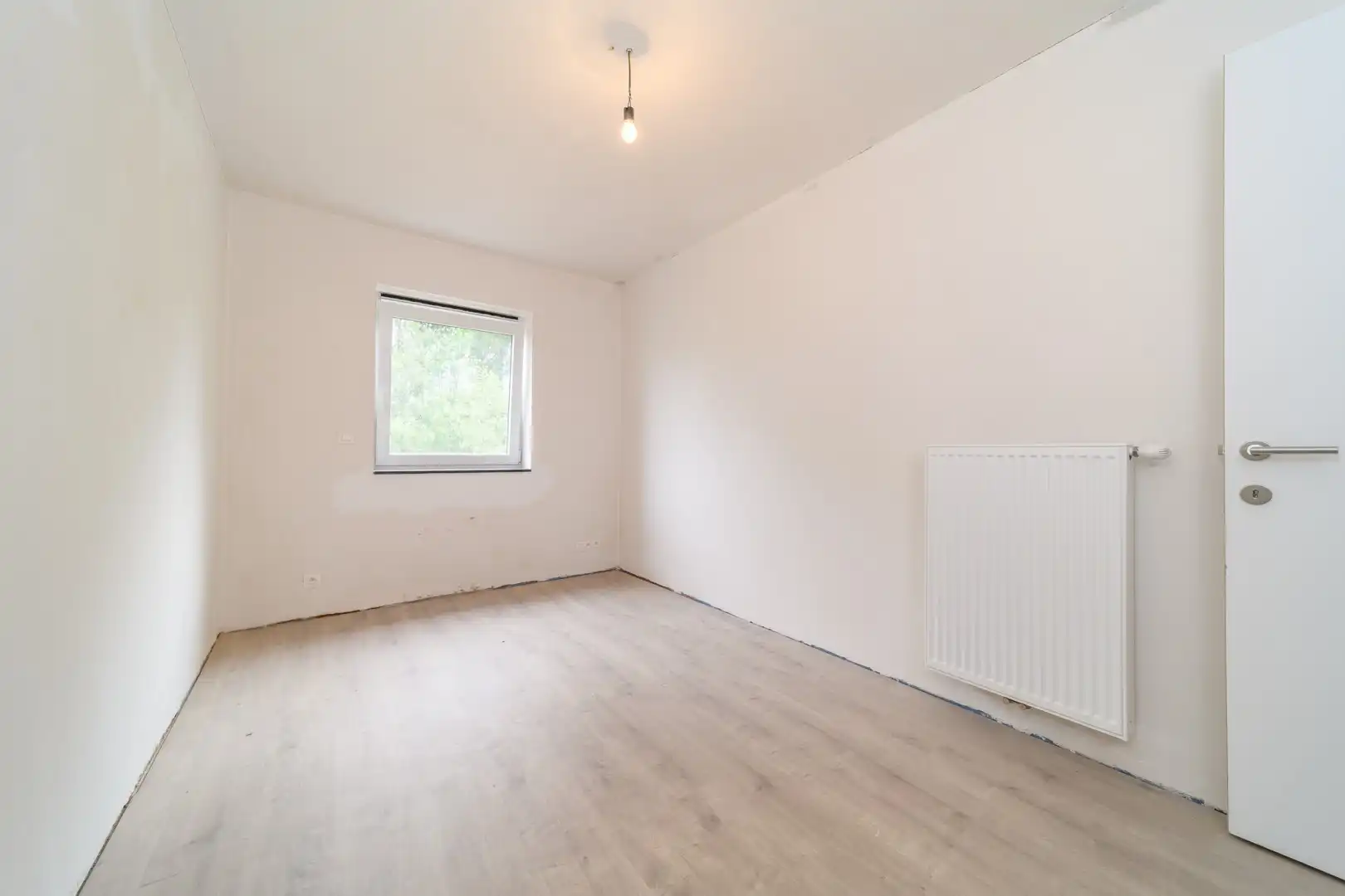 Gesloten bebouwing met tuin te Haaltert foto 11