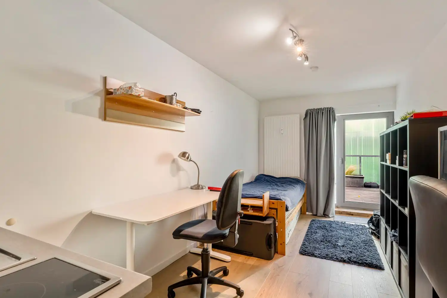 Centraal gelegen en gemeubelde studio met een gedeeld terras nabij het station van Leuven! foto 5