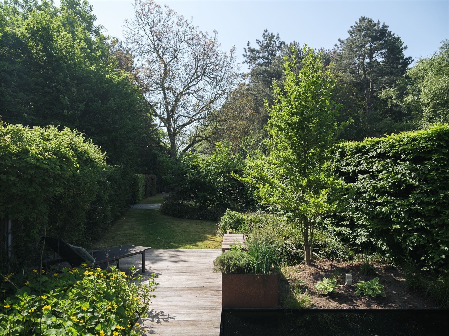 Instapklare gezinswoning met schitterende tuin foto 20