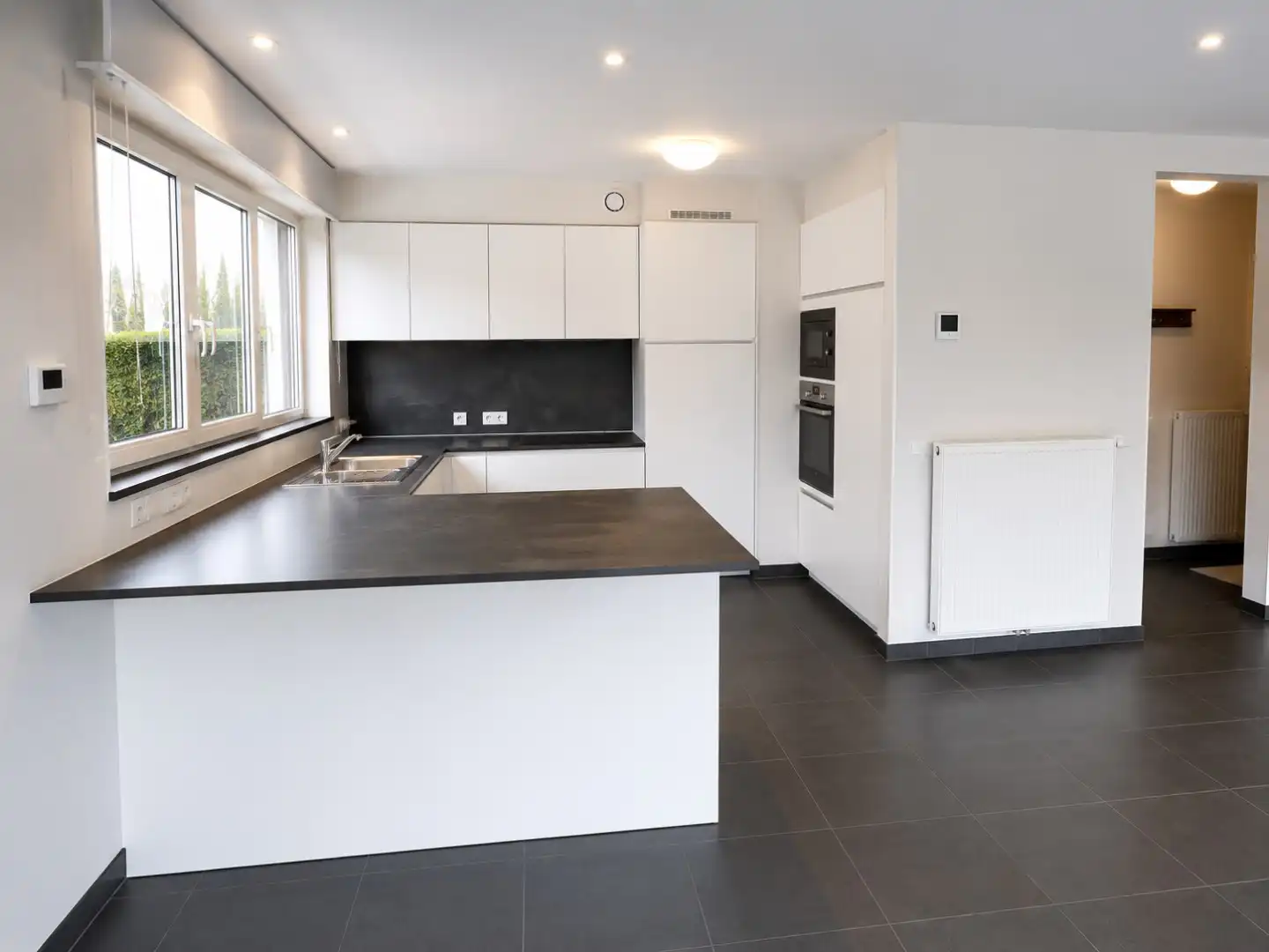 Energiezuinig appartement met twee slaapkamers en ruim terras te huur in Evergem foto 6