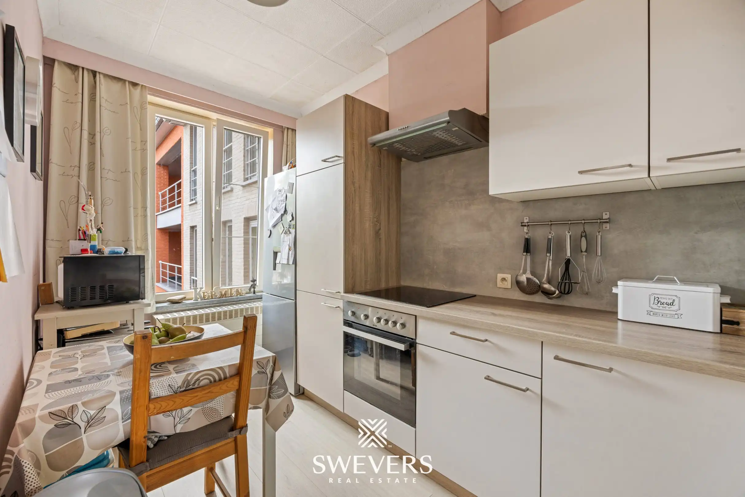 Gerenoveerd investeringspand met 2 verhuurde appartementen te Leopoldsburg foto 23