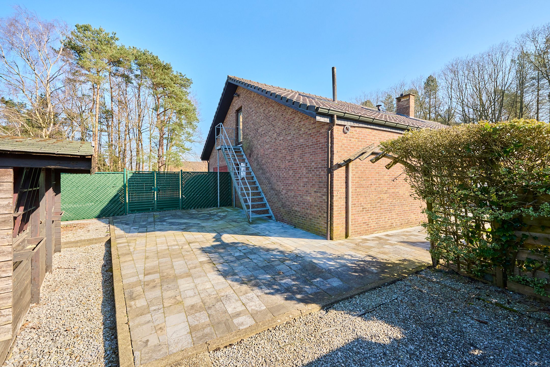 Zeer ruime gezinswoning + bovenliggend appartement foto 19