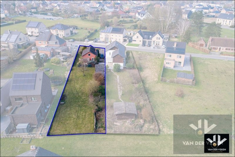 Hoofdfoto van de publicatie: Te renoveren (uitbreidbare) woning (6% btw) met garage op een rustig gelegen perceel van +- 11are op wandelafstand van het centrum van Diepenbeek!