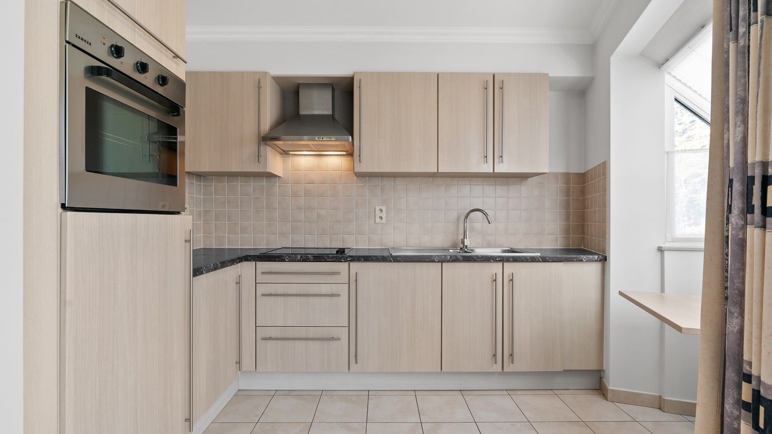 Instapklaar appartement met 1 ruime slaapkamer en kinderkamer in hartje Sint-Truiden foto 6