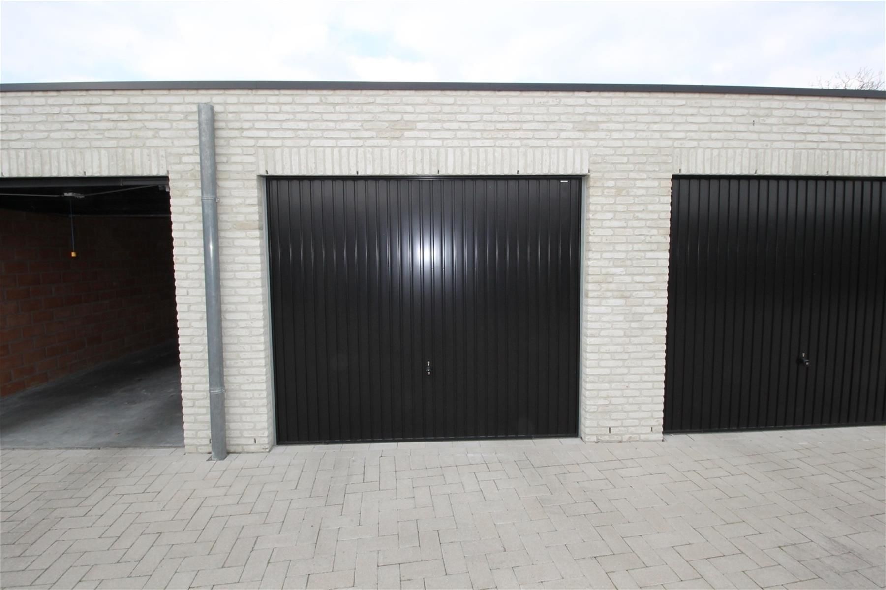 Dakappartement op derde verdieping links met terras en garage. foto 13