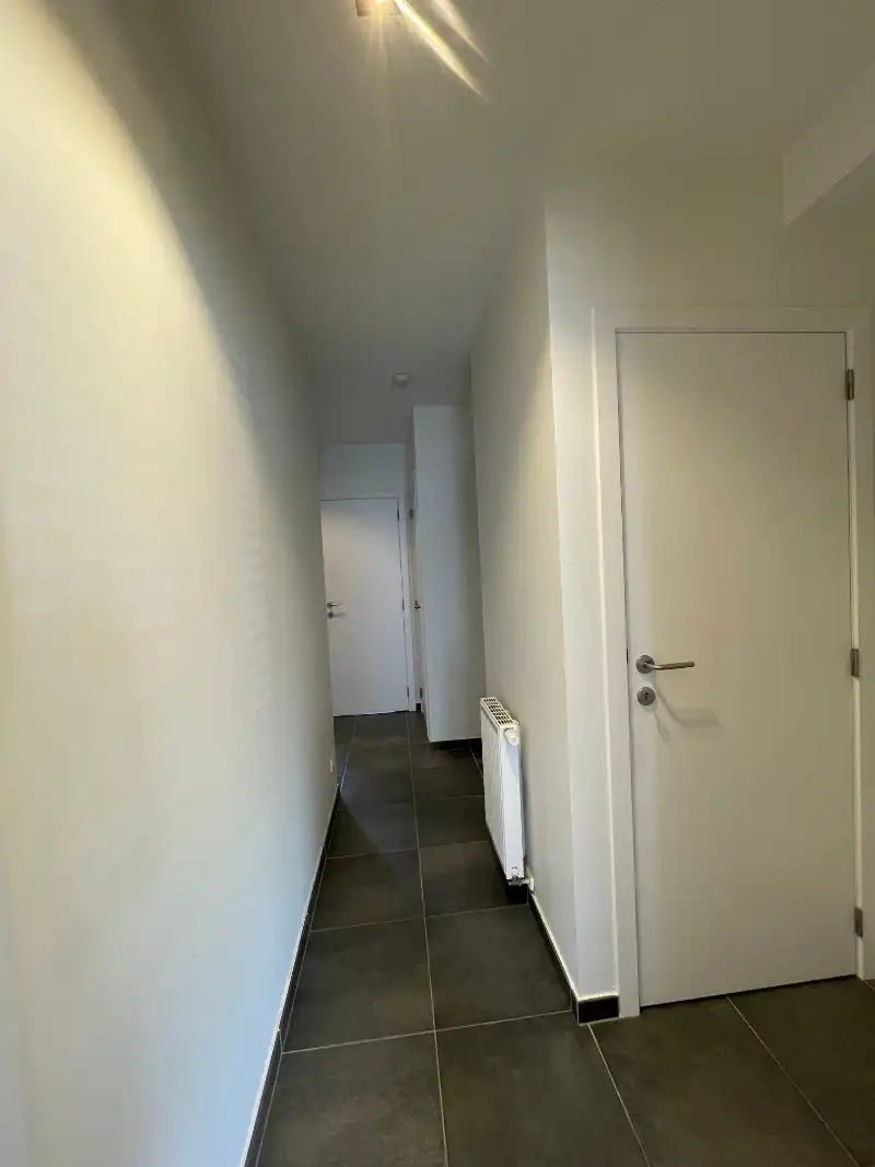 CENTRAAL GELEGEN GELIJKVLOERS APPARTEMENT MET GARAGE IN OOSTDUINKERKE-BAD! foto 11