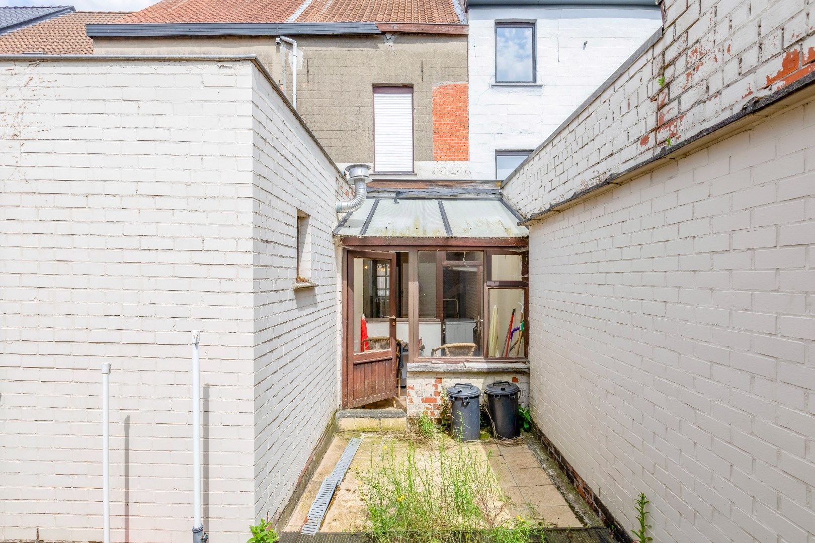 Te renoveren woning met stadstuin centraal gelegen in Sint-Amandsberg foto 16