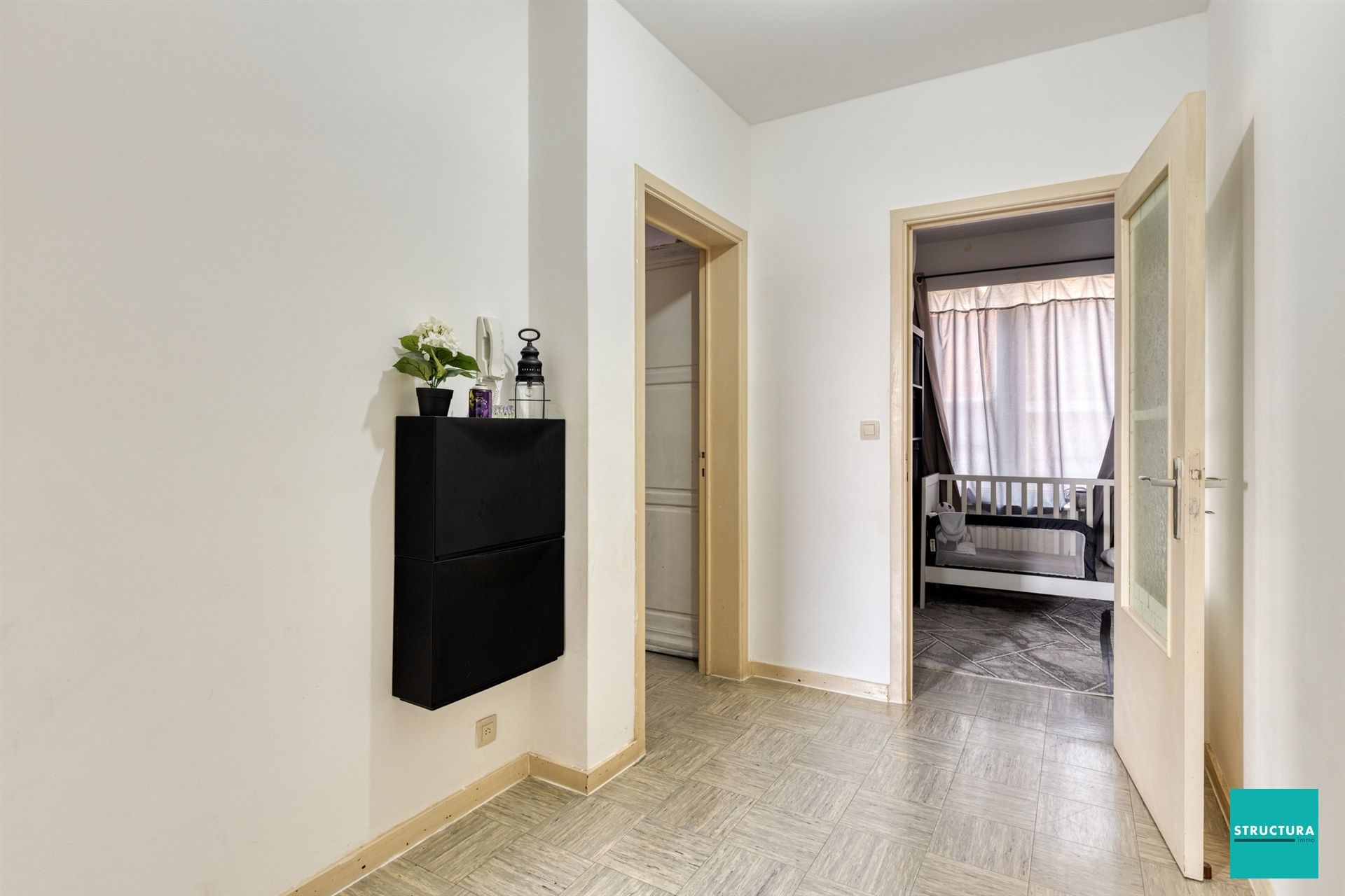 Opbrengsteigendom met 2 appartementen + 6 autostallingen foto 5