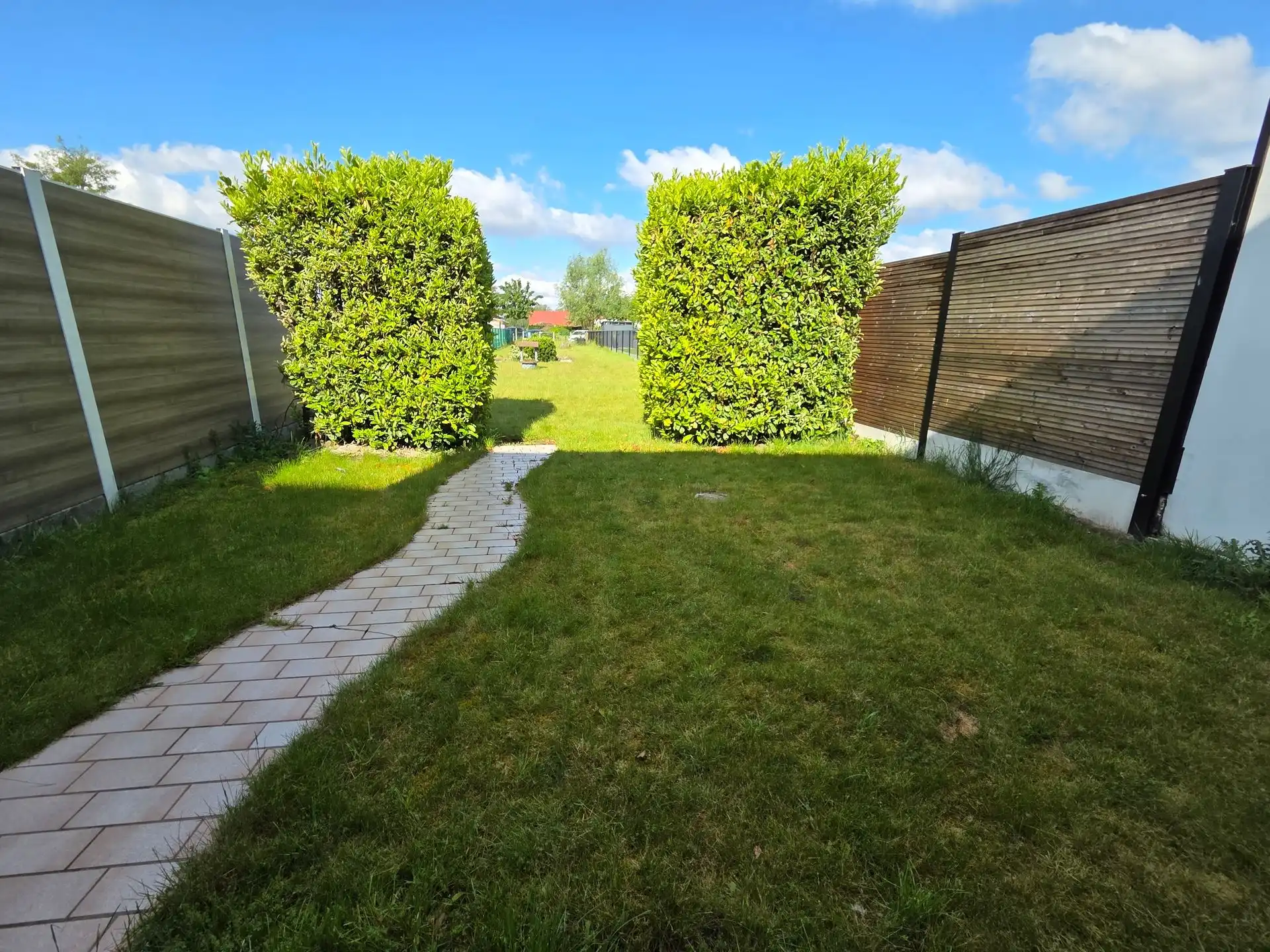 Instapklare gezellige woning met diepe tuin en garage foto 11