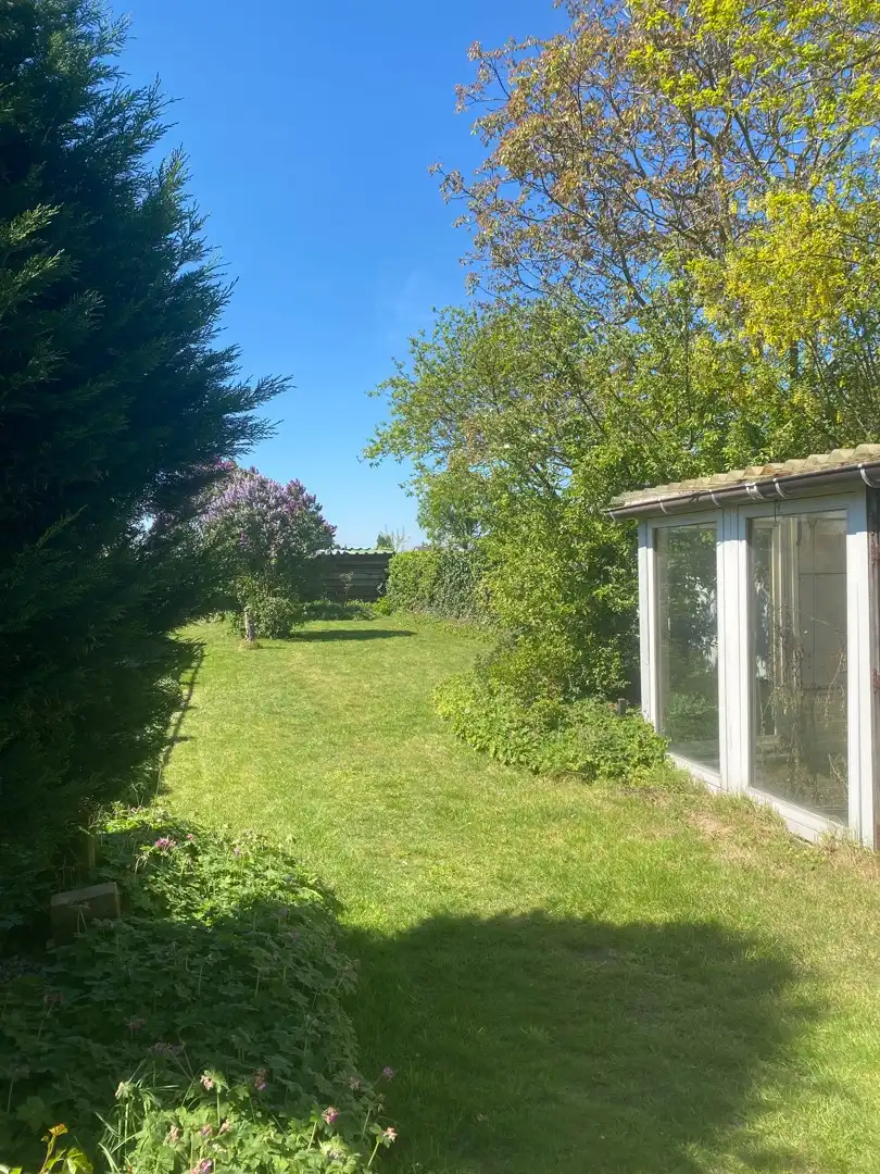 Centraal gelegen te renoveren woning met ruime garage en achterliggende tuin foto 19