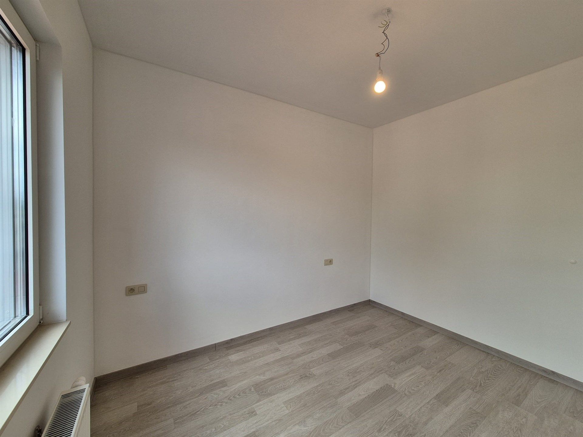 Zeer energiezuinige woning met 2 slaapkamers en tuin. foto 19