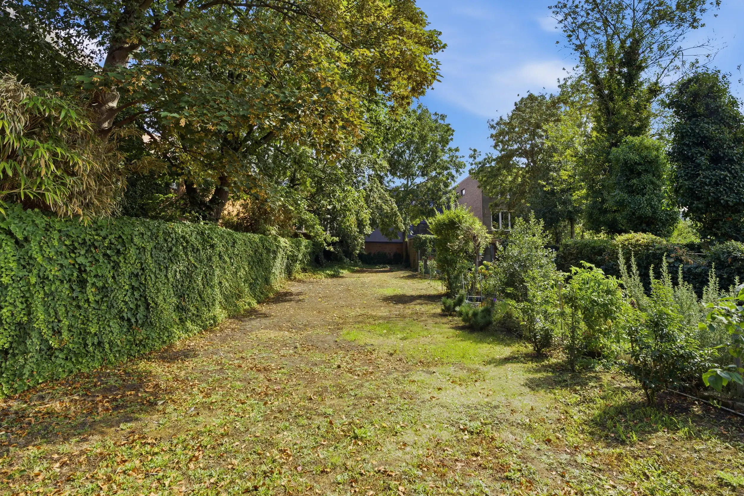 Uniek handelspand met duplex app. en tuin in hartje Wetteren foto 25
