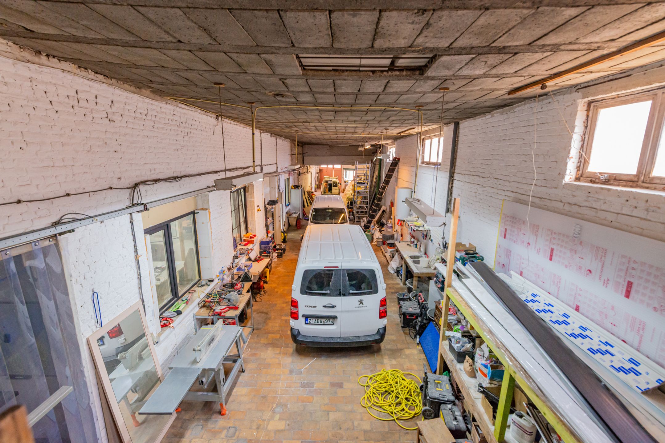 Opbrengsteigendom met 3 appartement + werkruimte foto 33