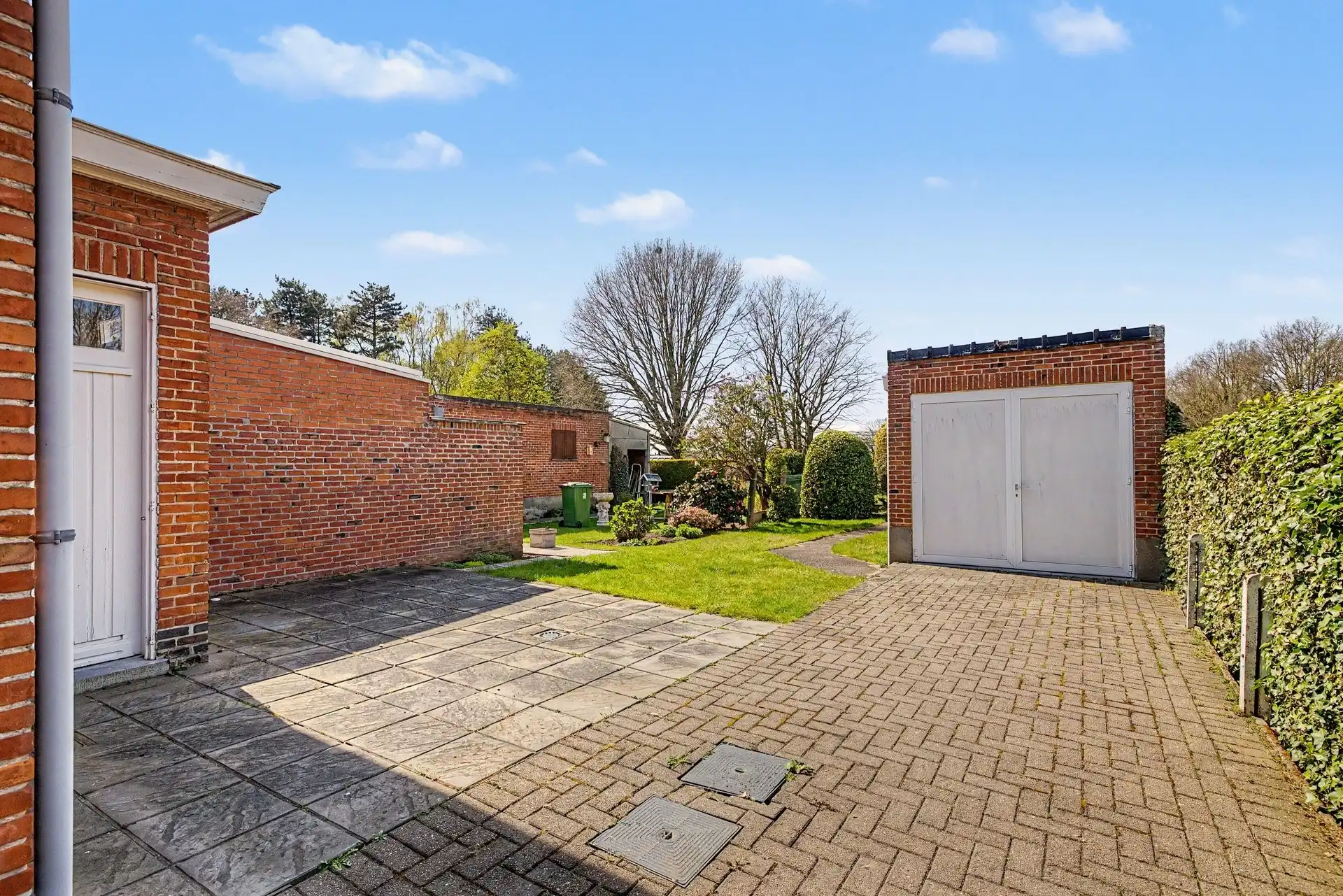 Te renoveren gezinswoning met garage en tuin nabij het centrum van De Klinge foto 21