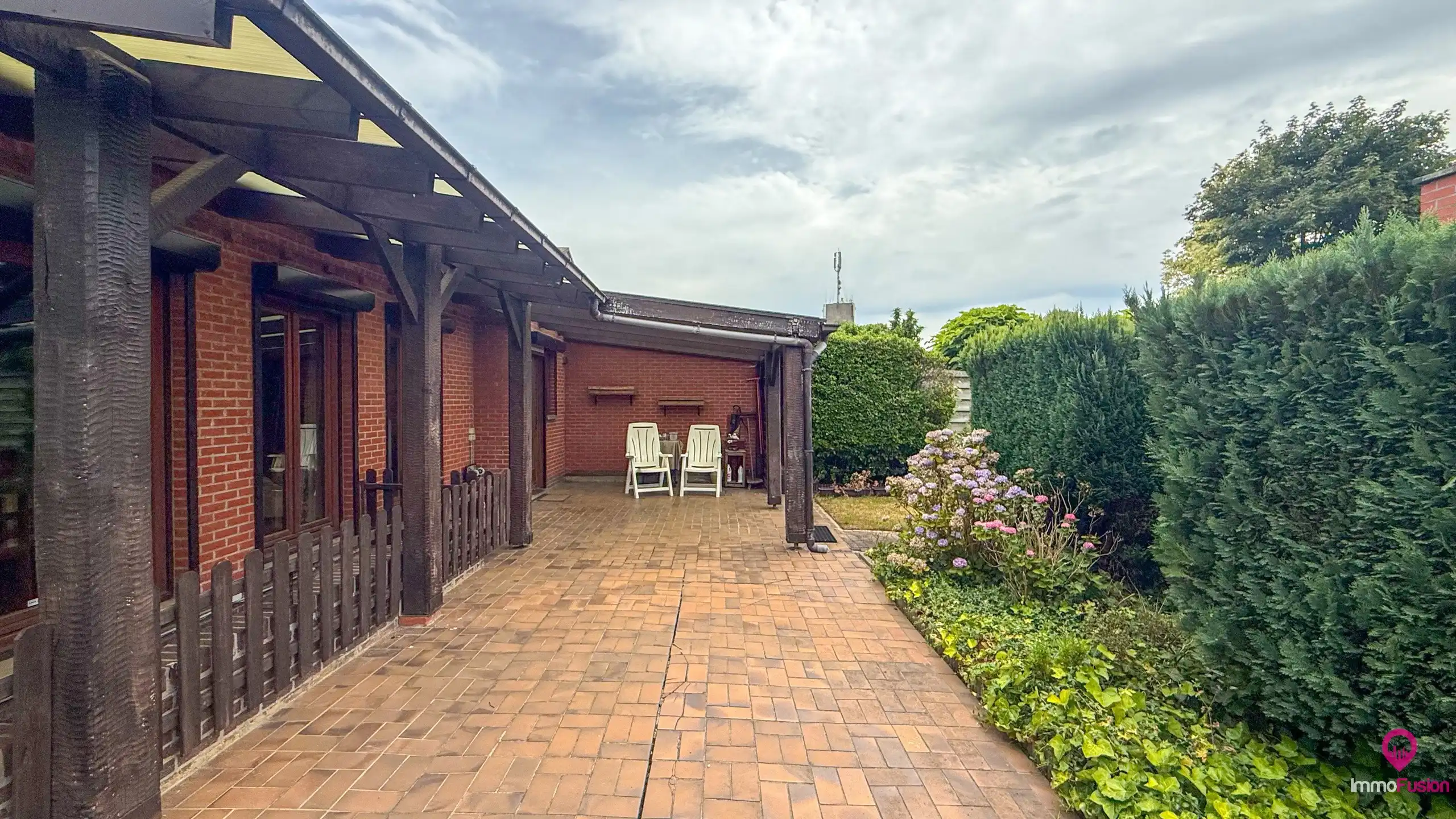 Gelijkvloerse woning met garage en overdekt terras! foto 32