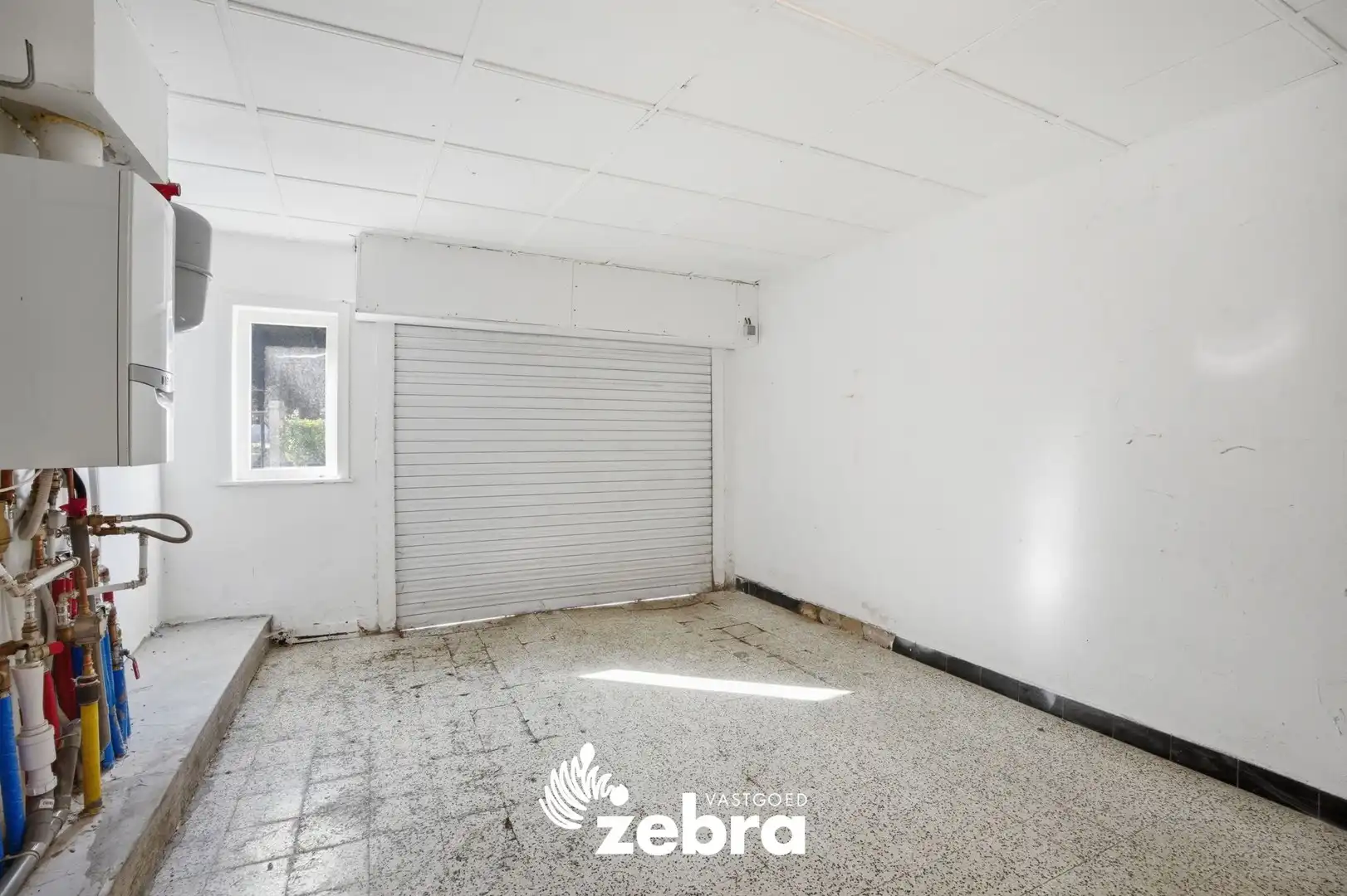 Charmante hoekwoning met garage en ruime bijgebouwen in Meulebeke! foto 12