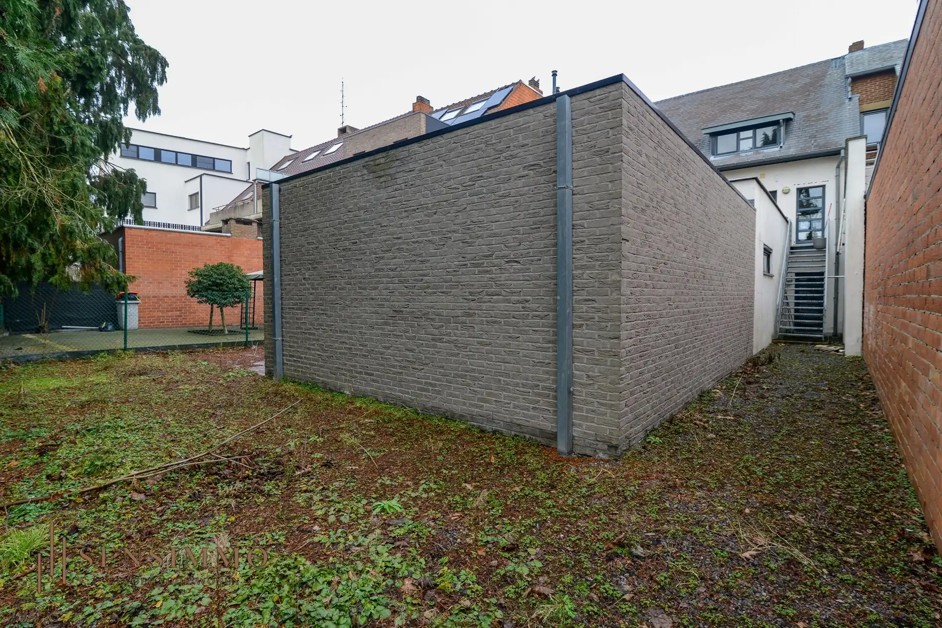 Commerciële handelspand met bovenliggend appartement in hartje Maasmechelen foto 25