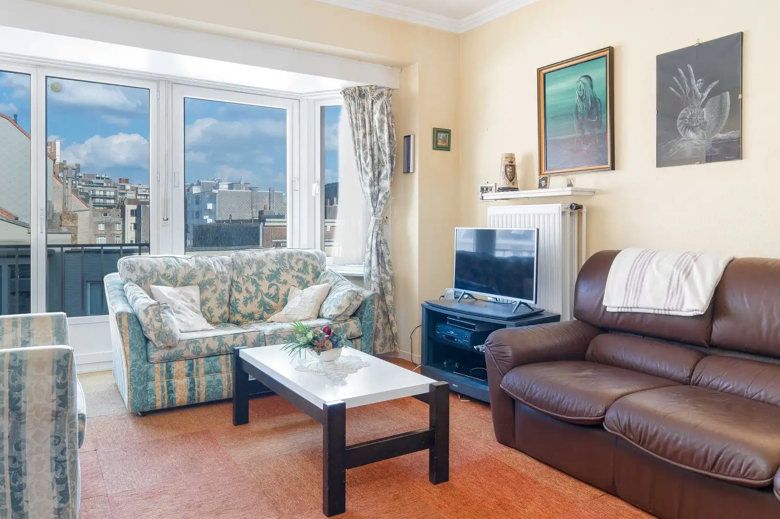 Licht op te frissen appartement op toplocatie! foto 4